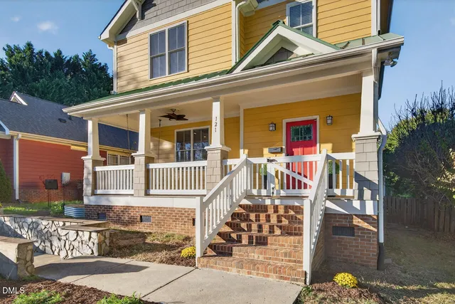 front view of a house with a small yard