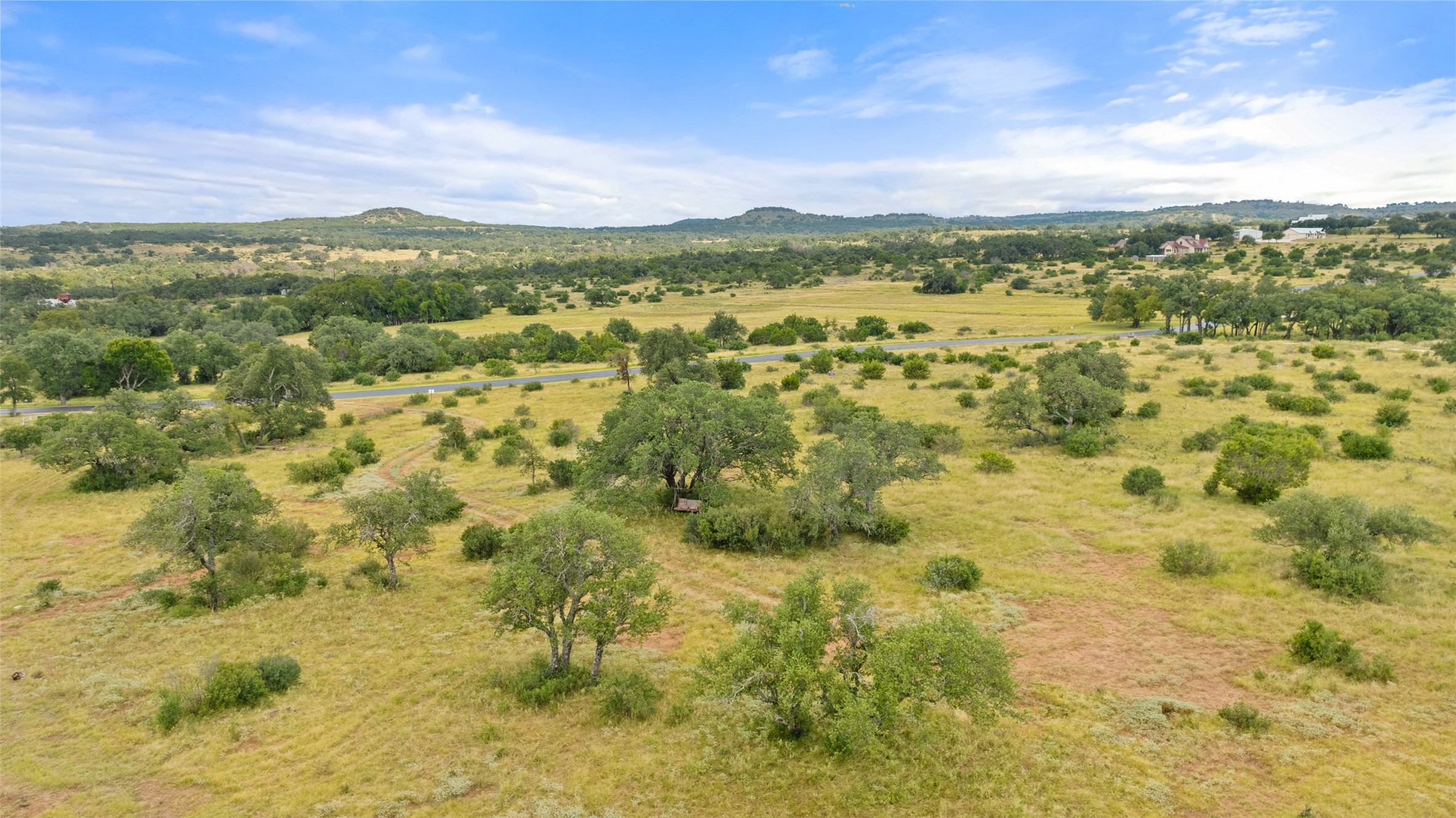 Lot 37 Vista Rdg Drive Round Mountain, TX 78663 - Photo 1 of 30 Overview of rural landscape with mountains