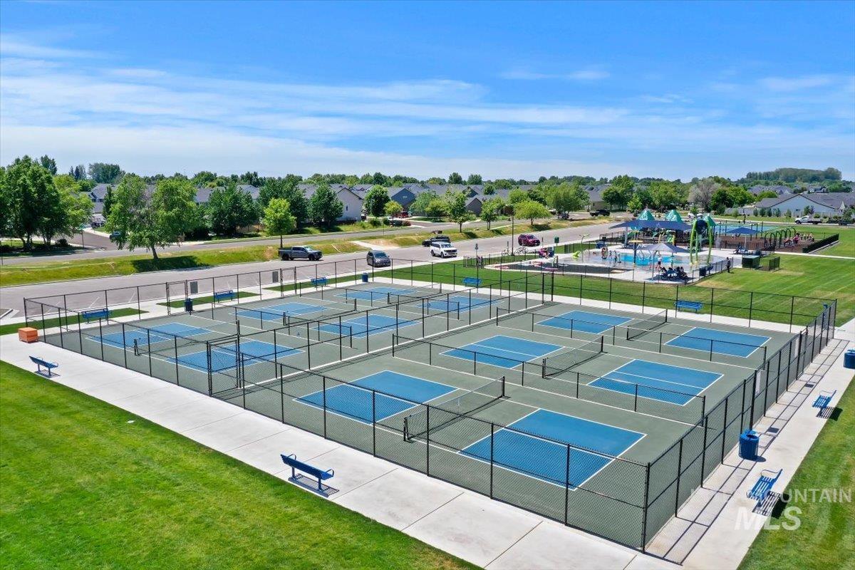 12310 West Hidden Point Drive Star, ID 83669 - Photo 46 of 48 Multiple fenced pickleball courts with paved surrounds