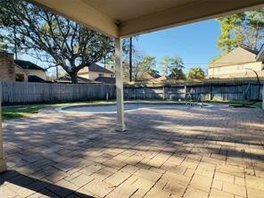 5330 Nodaway Lane Spring, TX 77379 - Photo 12 of 14 a view of a yard with a tree