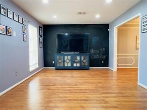 5330 Nodaway Lane Spring, TX 77379 - Photo 5 of 14 a view of an empty room with wooden floor and a window