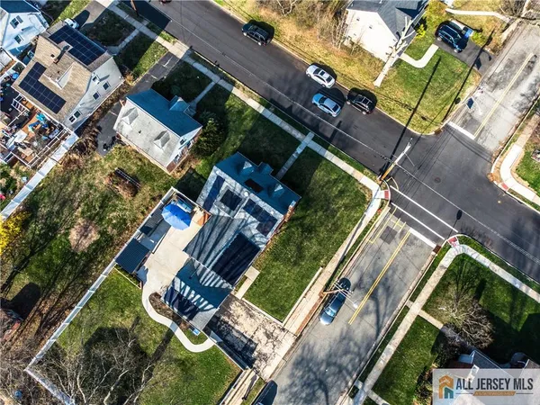 an aerial view of residential building and lake view