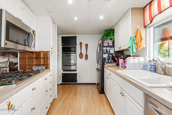 a view of a balcony with chairs
