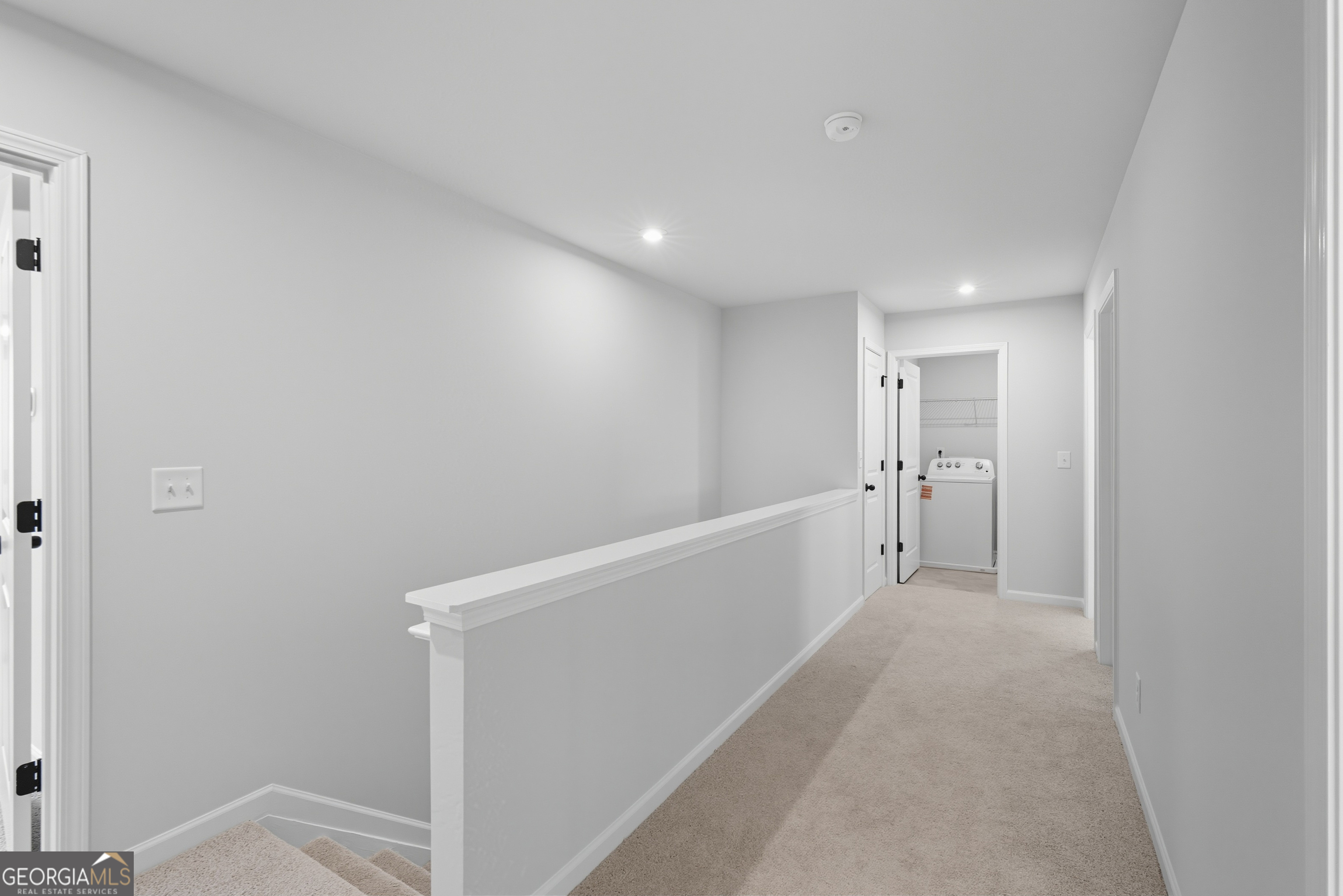 103 Everest Court Dallas, GA 30132 - Photo 25 of 35 a view of a hallway with wooden floor