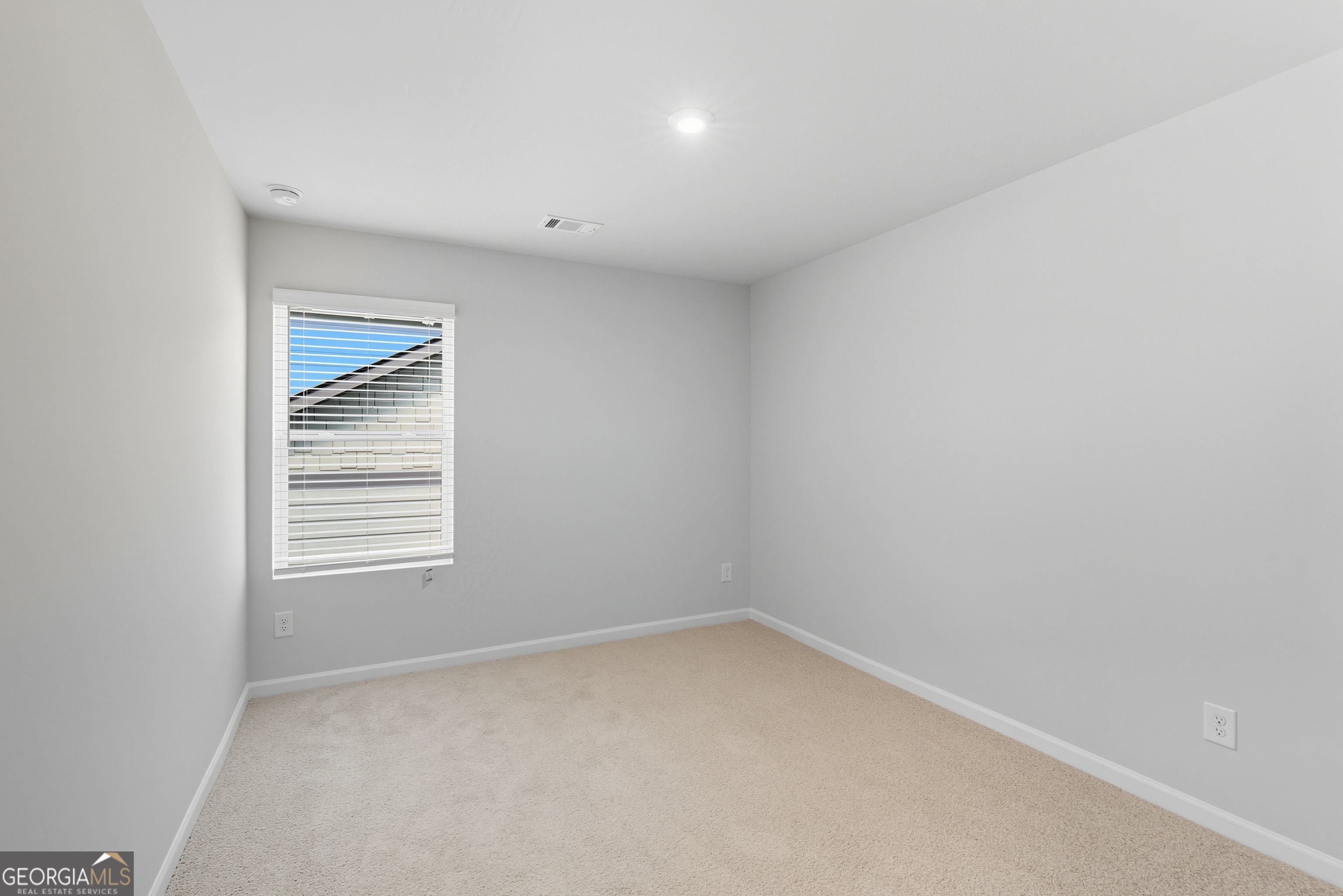 103 Everest Court Dallas, GA 30132 - Photo 31 of 35 a view of an empty room with a window