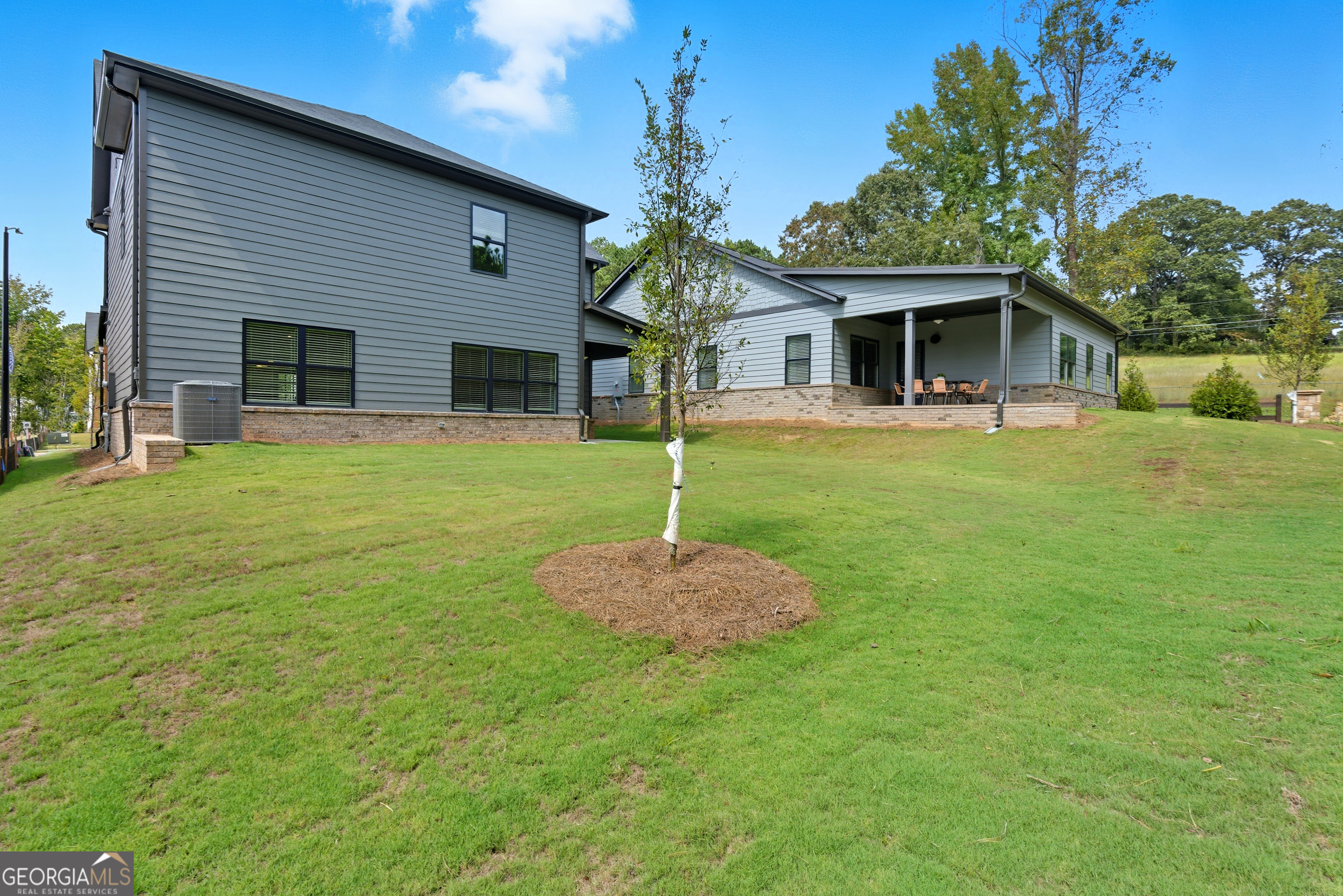 103 Everest Court Dallas, GA 30132 - Photo 8 of 35 a front view of a house with a yard