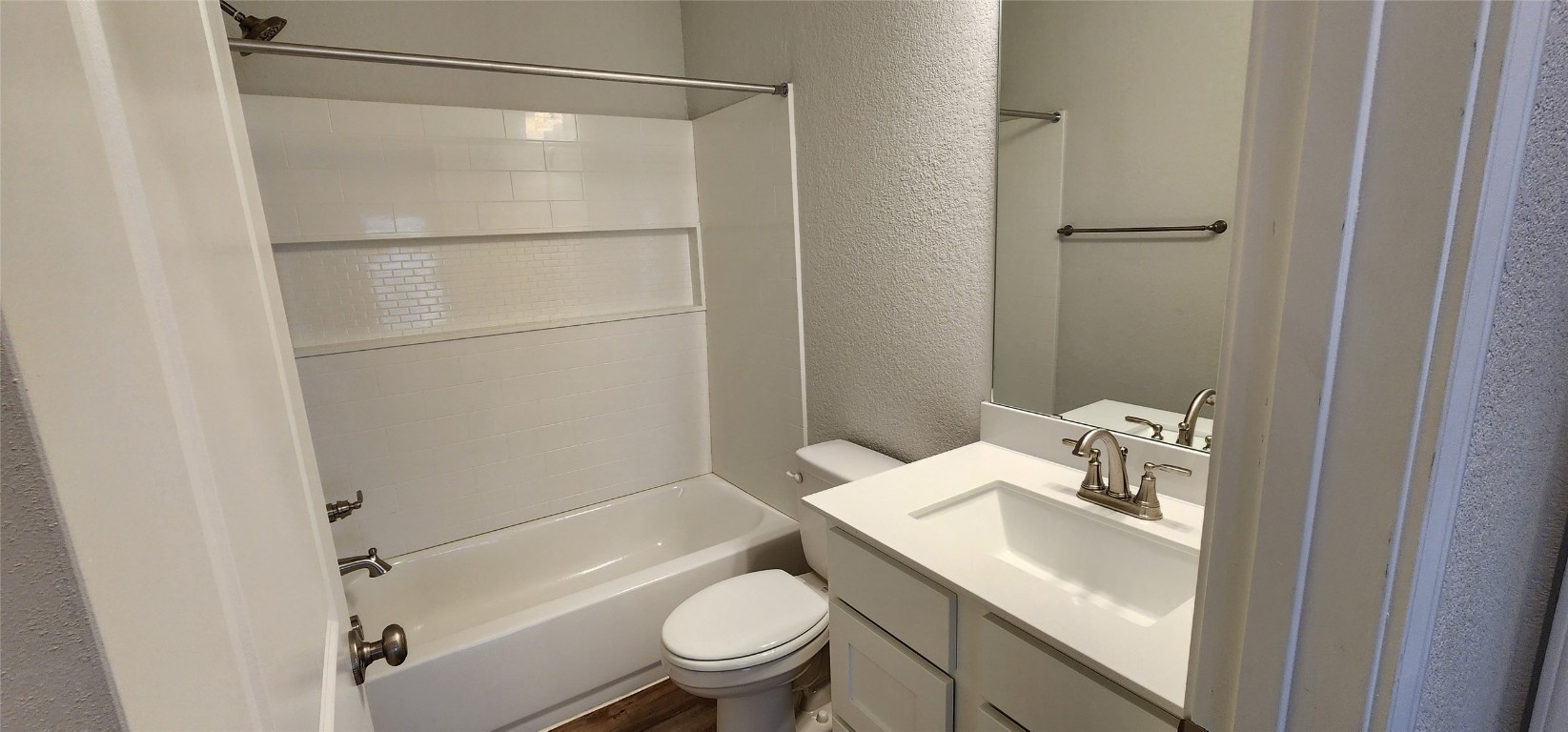 212 Los Olives Lane Georgetown, TX 78628 - Photo 15 of 35 a bathroom with a sink toilet and shower