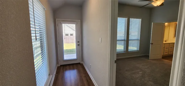 an empty room with windows