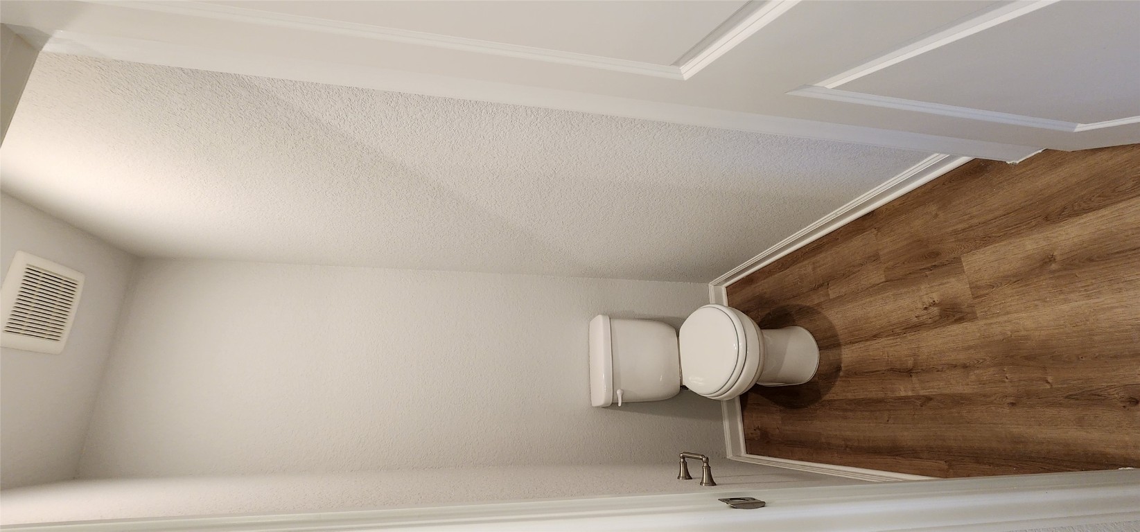 212 Los Olives Lane Georgetown, TX 78628 - Photo 24 of 35 a white toilet sitting next to a white sink