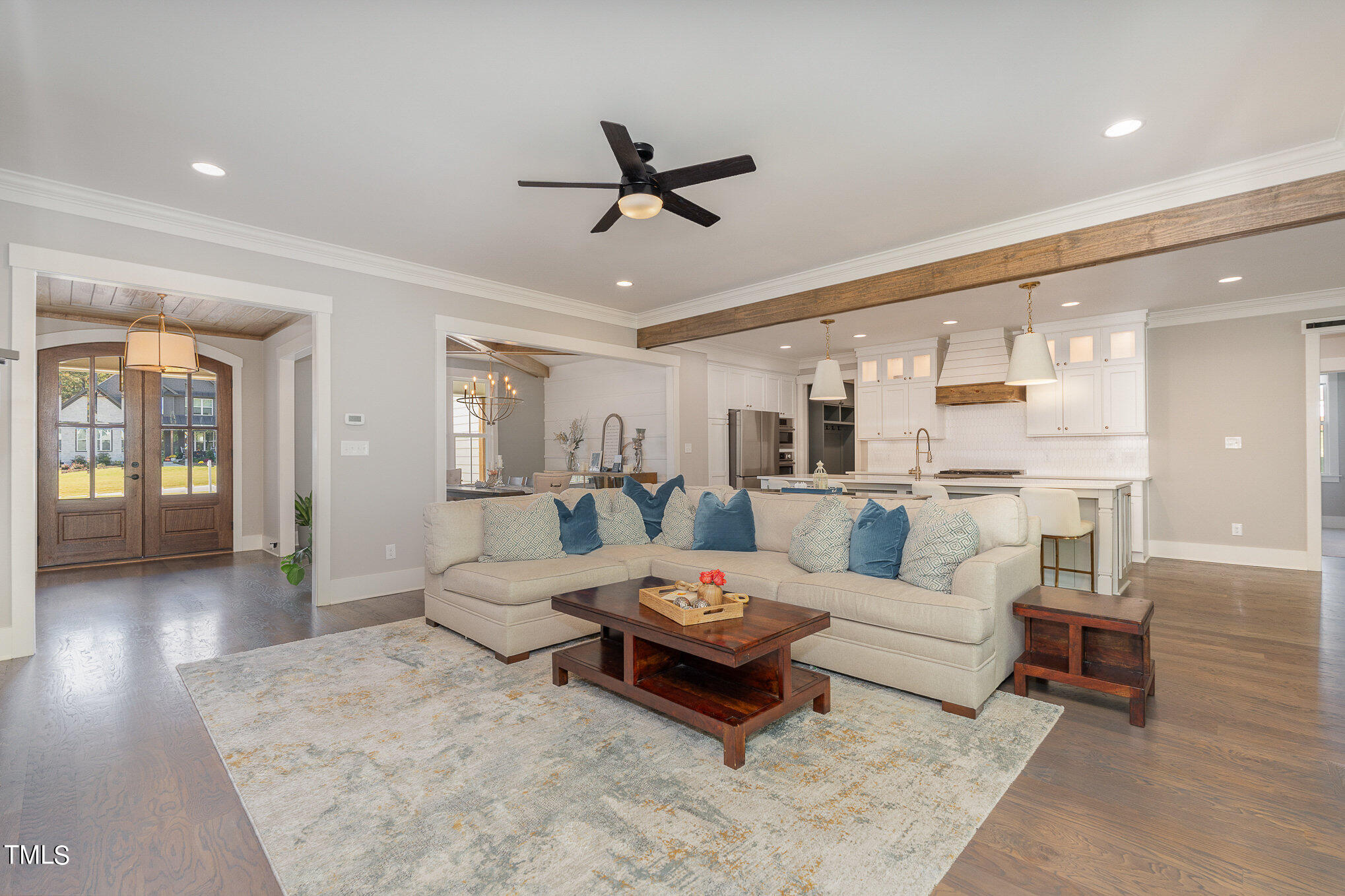 1633 Sweetwater Lane Raleigh, NC 27610 - Photo 14 of 54 a living room with furniture and view of kitchen