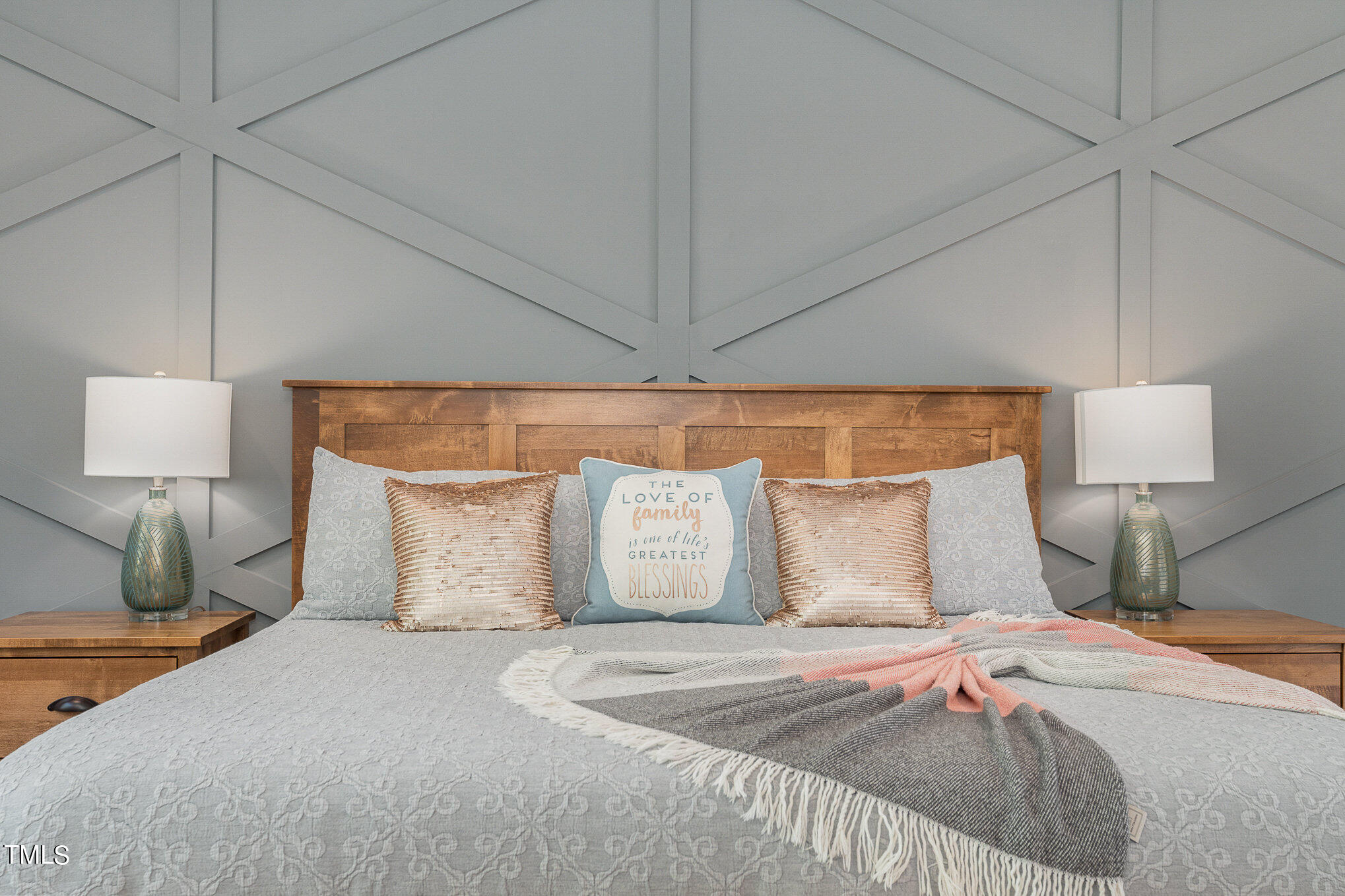 1633 Sweetwater Lane Raleigh, NC 27610 - Photo 24 of 54 a bedroom with a bed and a lamp