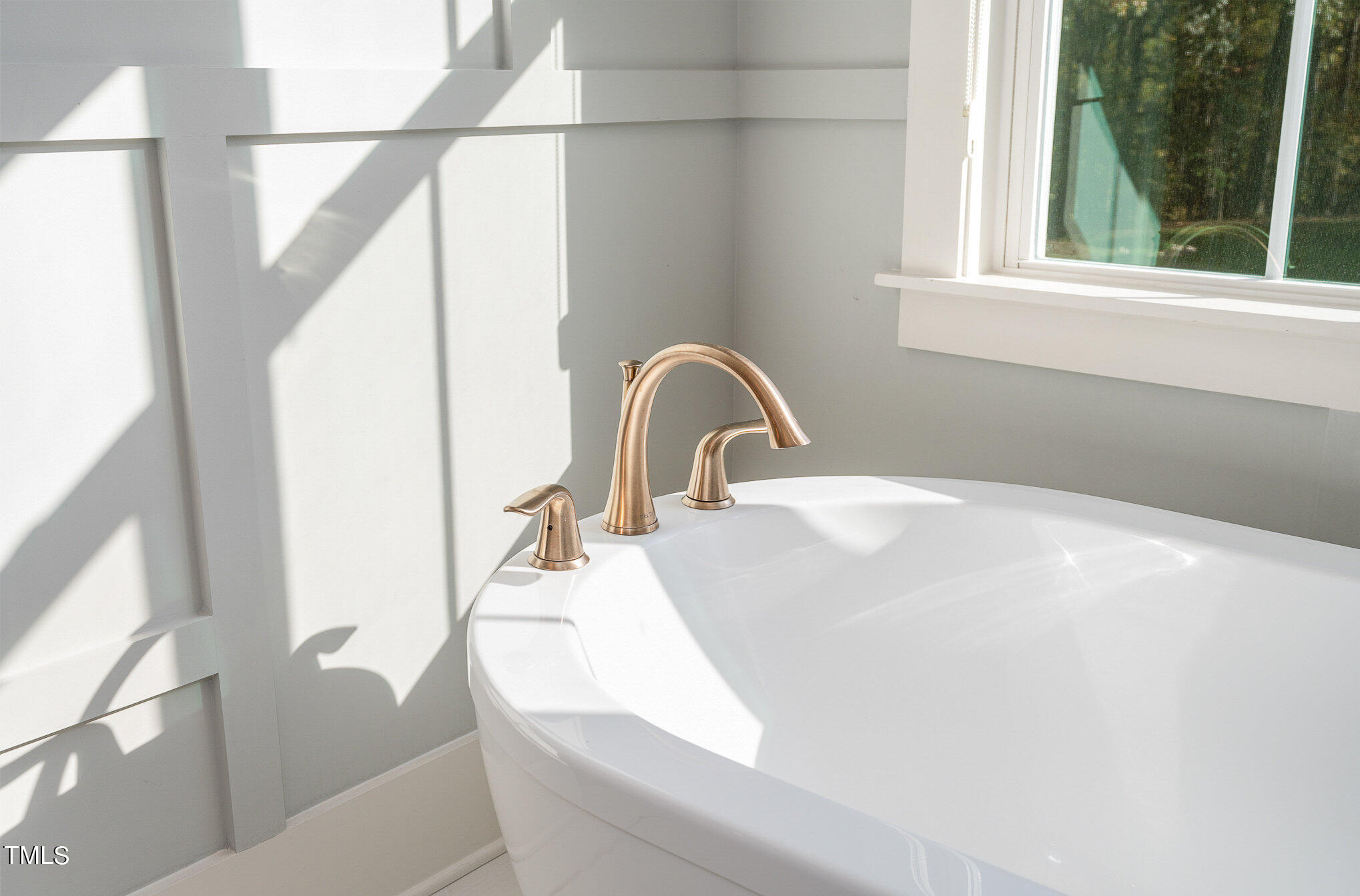 1633 Sweetwater Lane Raleigh, NC 27610 - Photo 28 of 54 a close view of a sink a faucet and a window