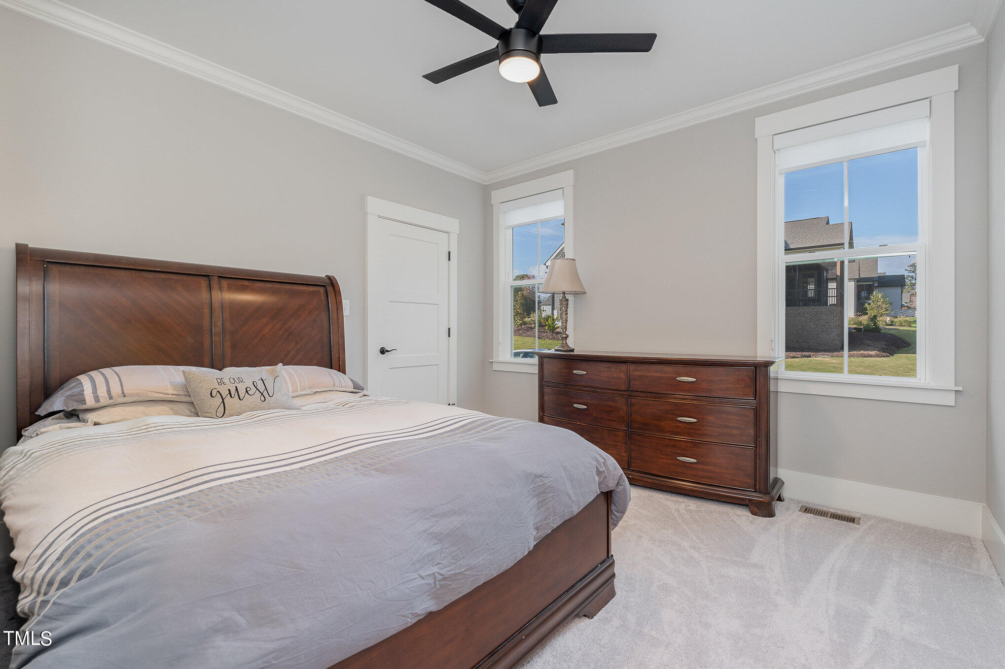 1633 Sweetwater Lane Raleigh, NC 27610 - Photo 30 of 54 a bedroom with a bed and window