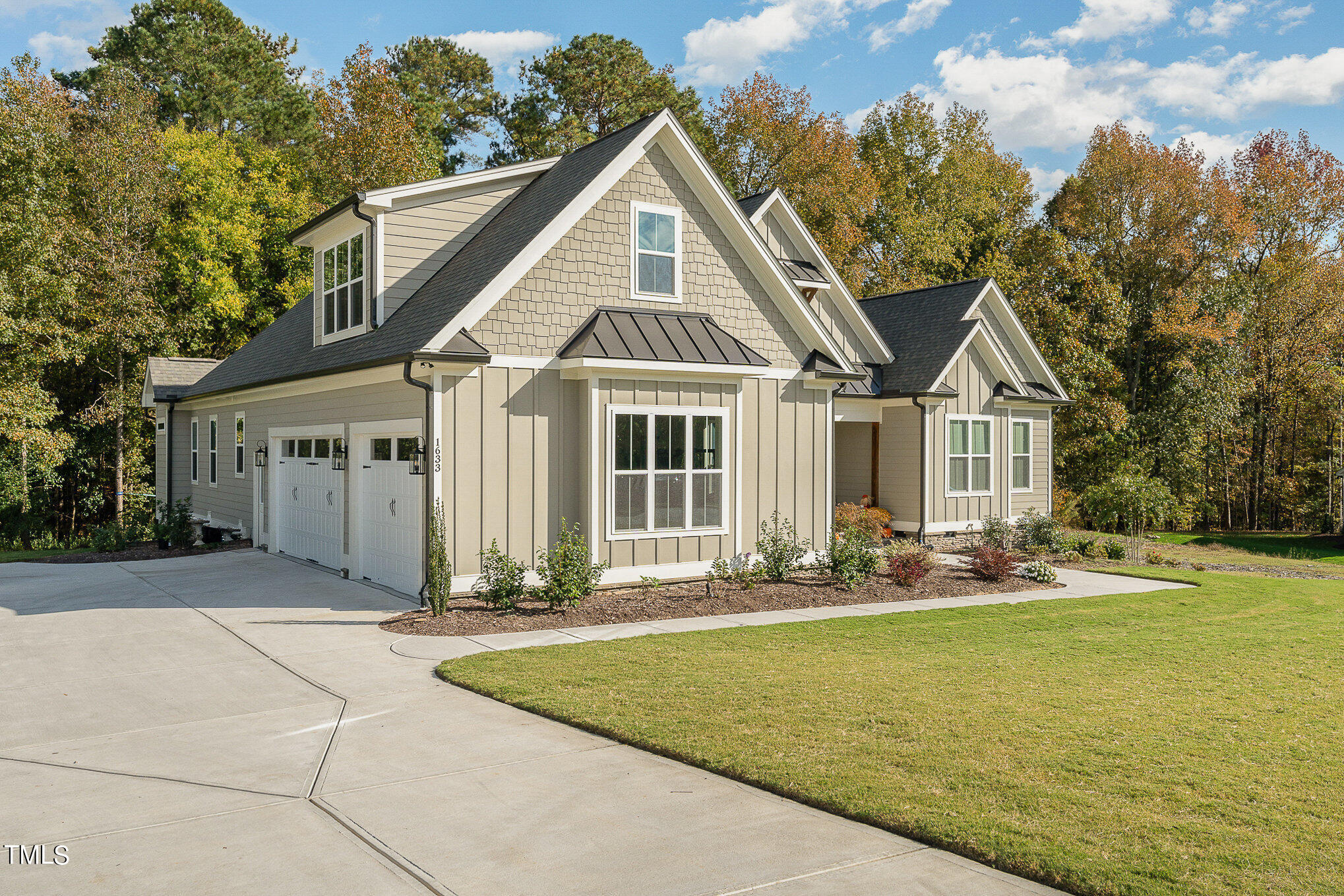 1633 Sweetwater Lane Raleigh, NC 27610 - Photo 3 of 54 a front view of a house with a yard