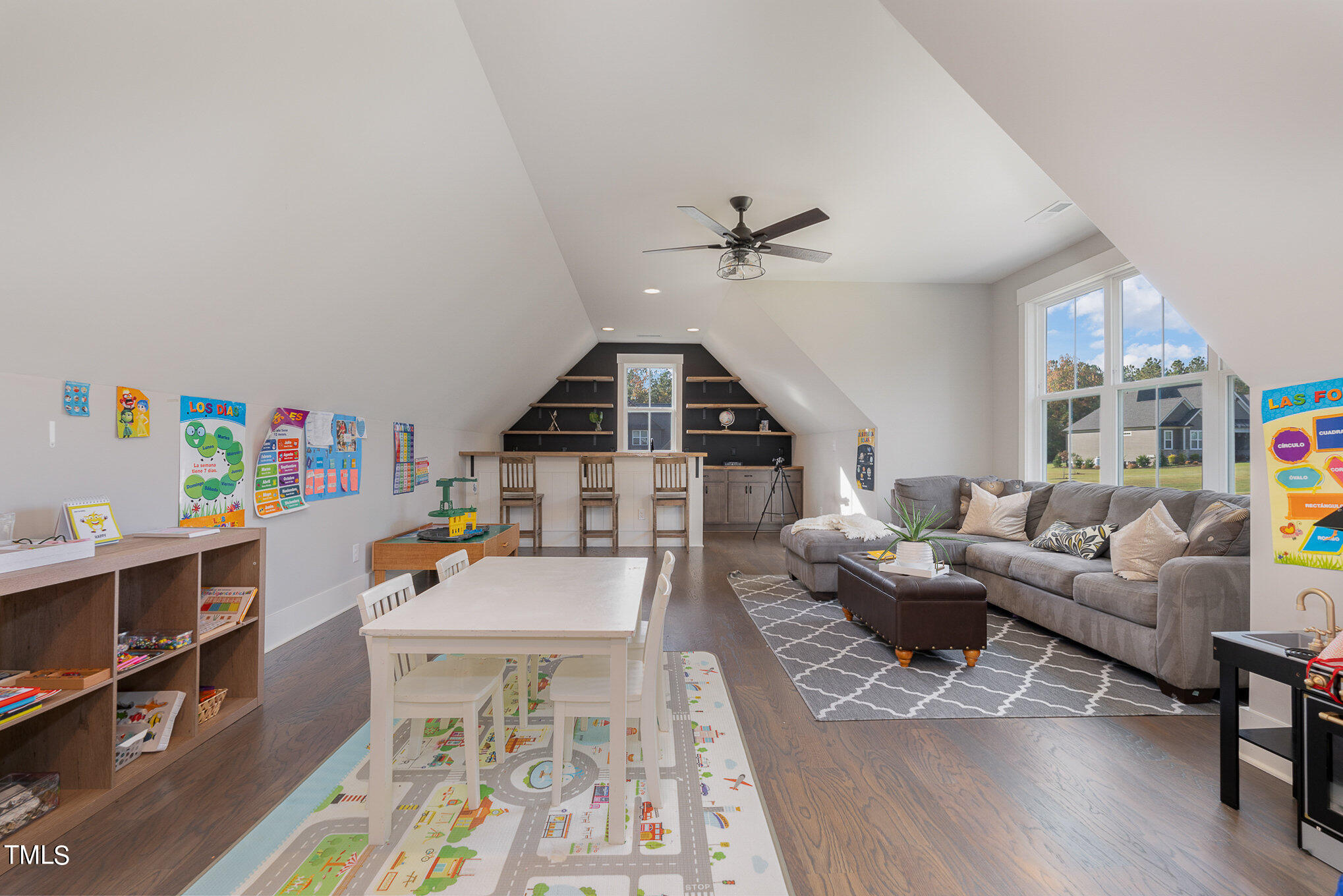 1633 Sweetwater Lane Raleigh, NC 27610 - Photo 36 of 54 a living room with furniture and a wooden floor