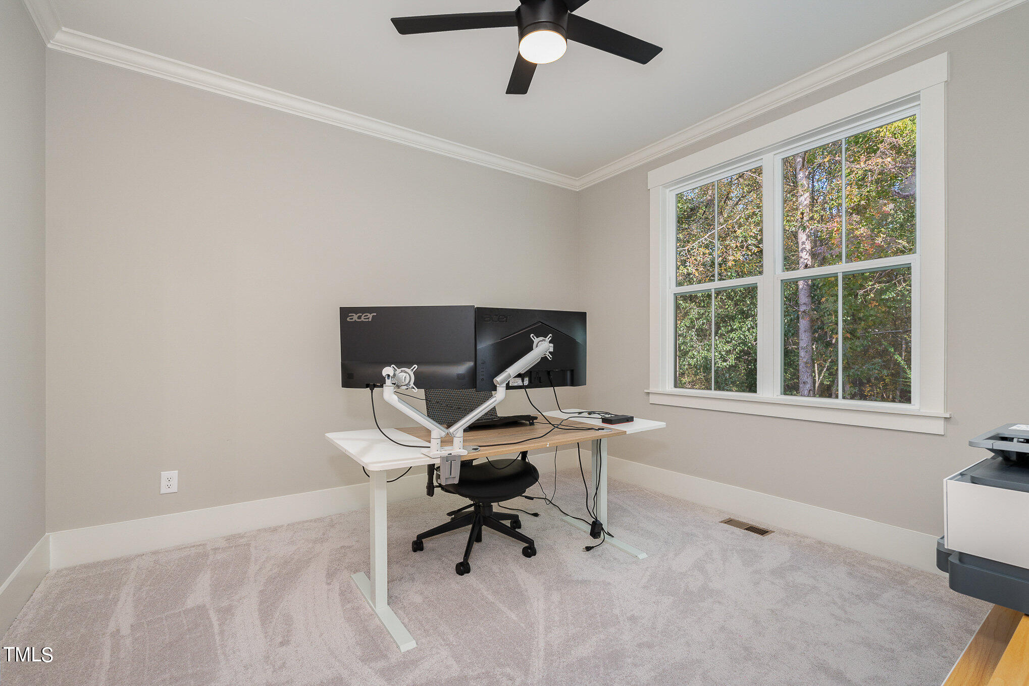 1633 Sweetwater Lane Raleigh, NC 27610 - Photo 40 of 54 a work room with furniture and a window