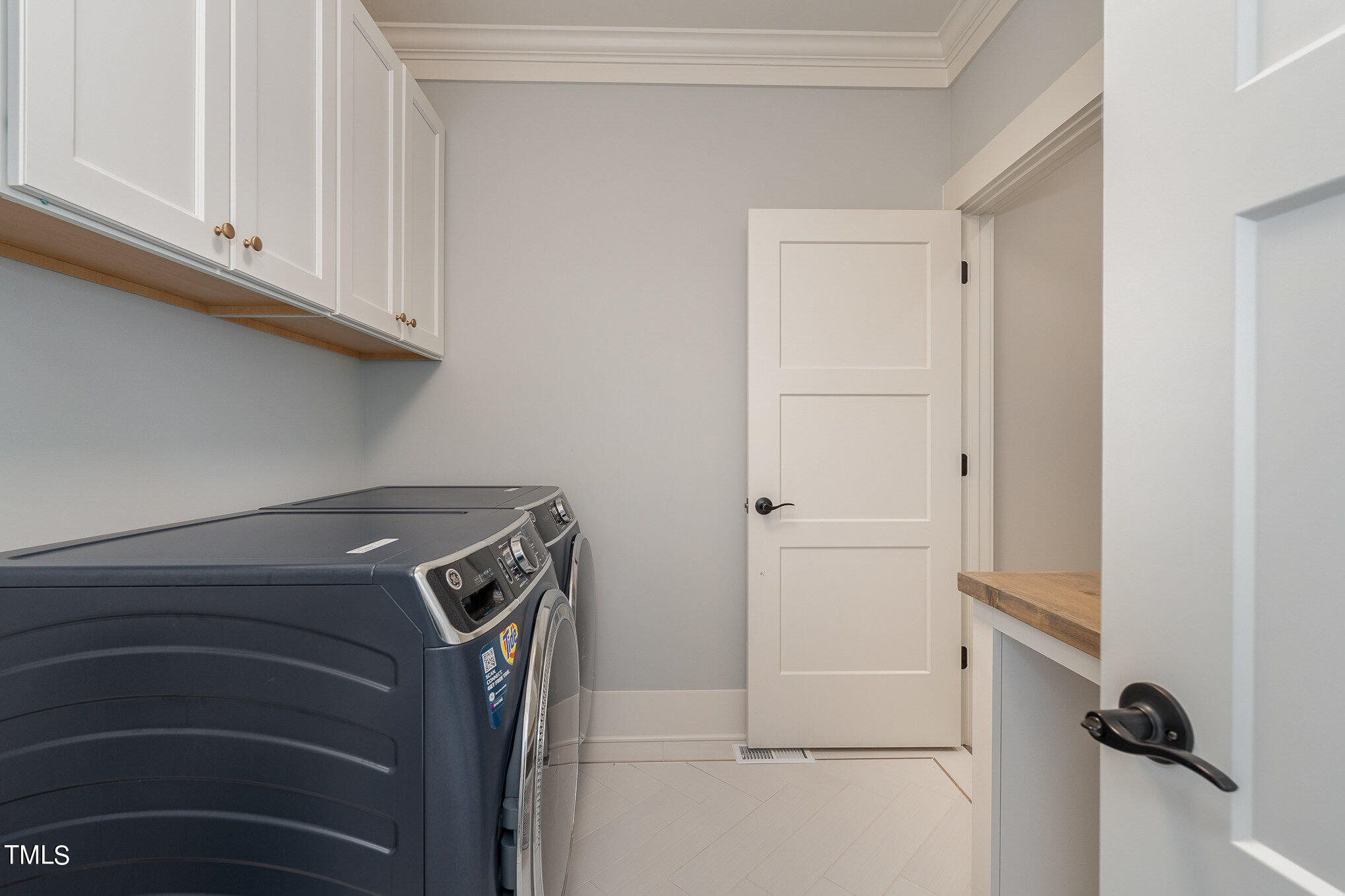 1633 Sweetwater Lane Raleigh, NC 27610 - Photo 42 of 54 a utility room with dryer and washer