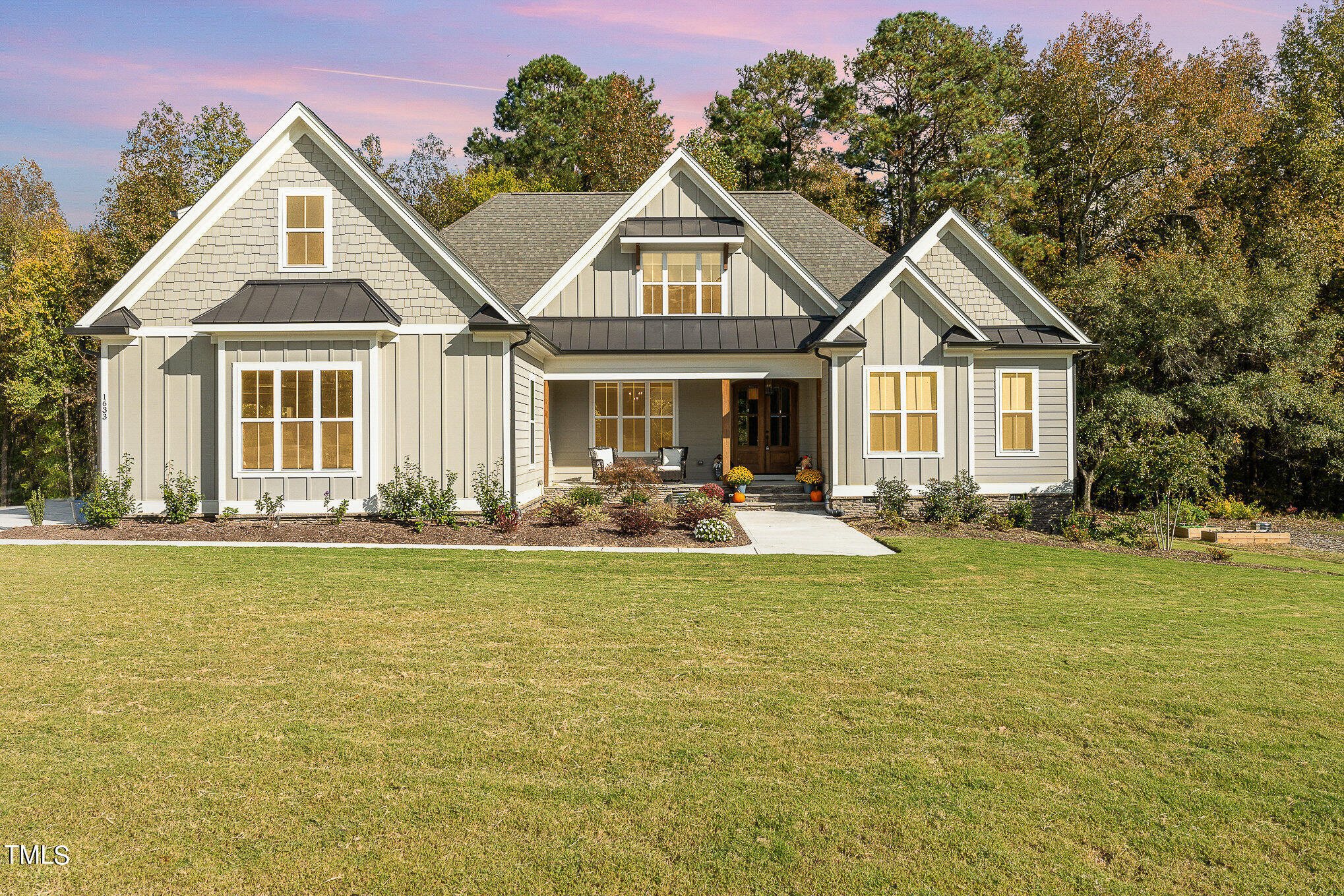 1633 Sweetwater Lane Raleigh, NC 27610 - Photo 47 of 54 a front view of a house with swimming pool