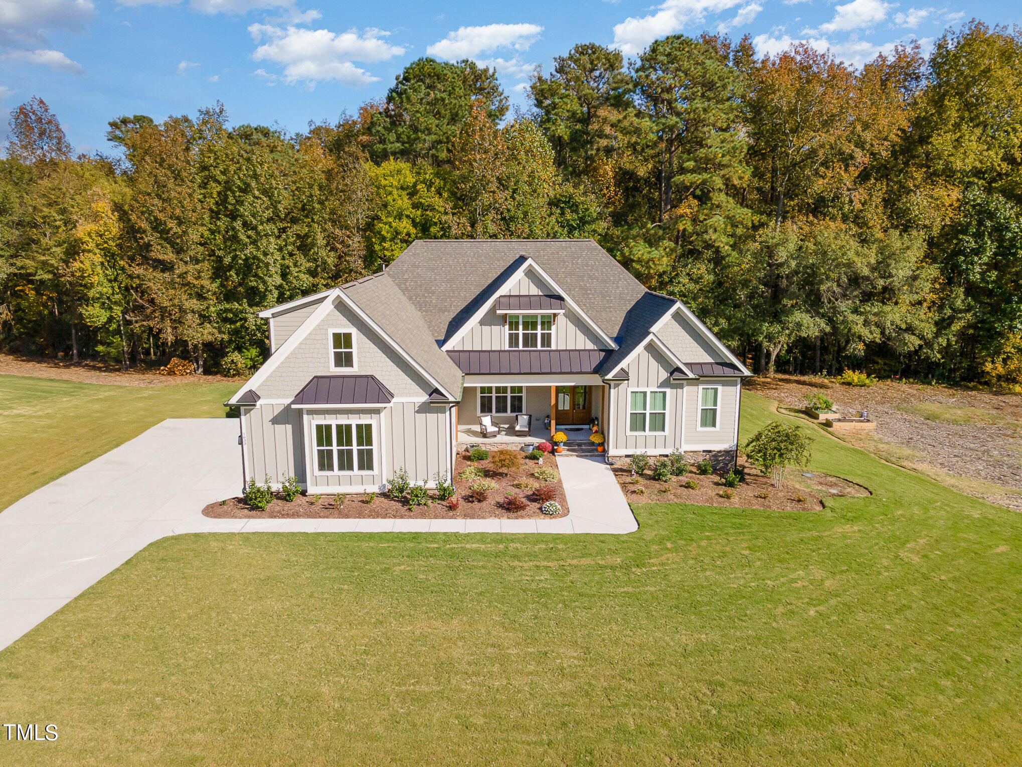 1633 Sweetwater Lane Raleigh, NC 27610 - Photo 48 of 54 a front view of a house with garden