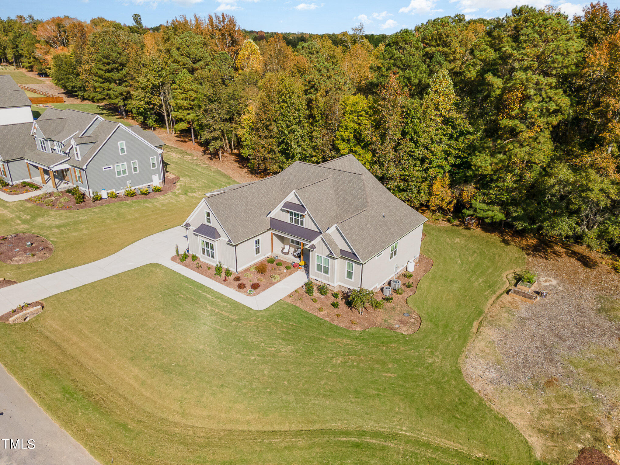 1633 Sweetwater Lane Raleigh, NC 27610 - Photo 50 of 54 an aerial view of residential houses with outdoor space