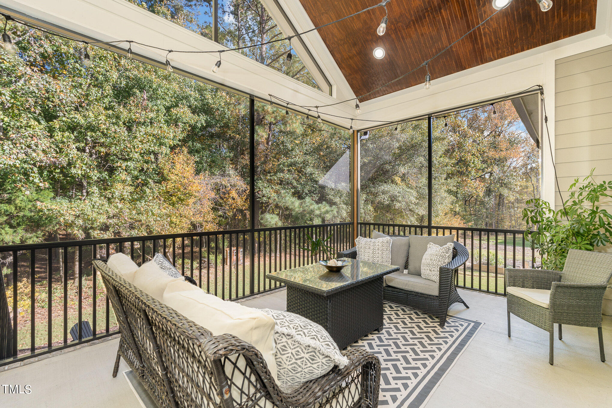 1633 Sweetwater Lane Raleigh, NC 27610 - Photo 5 of 54 a balcony with wooden floor and outdoor seating