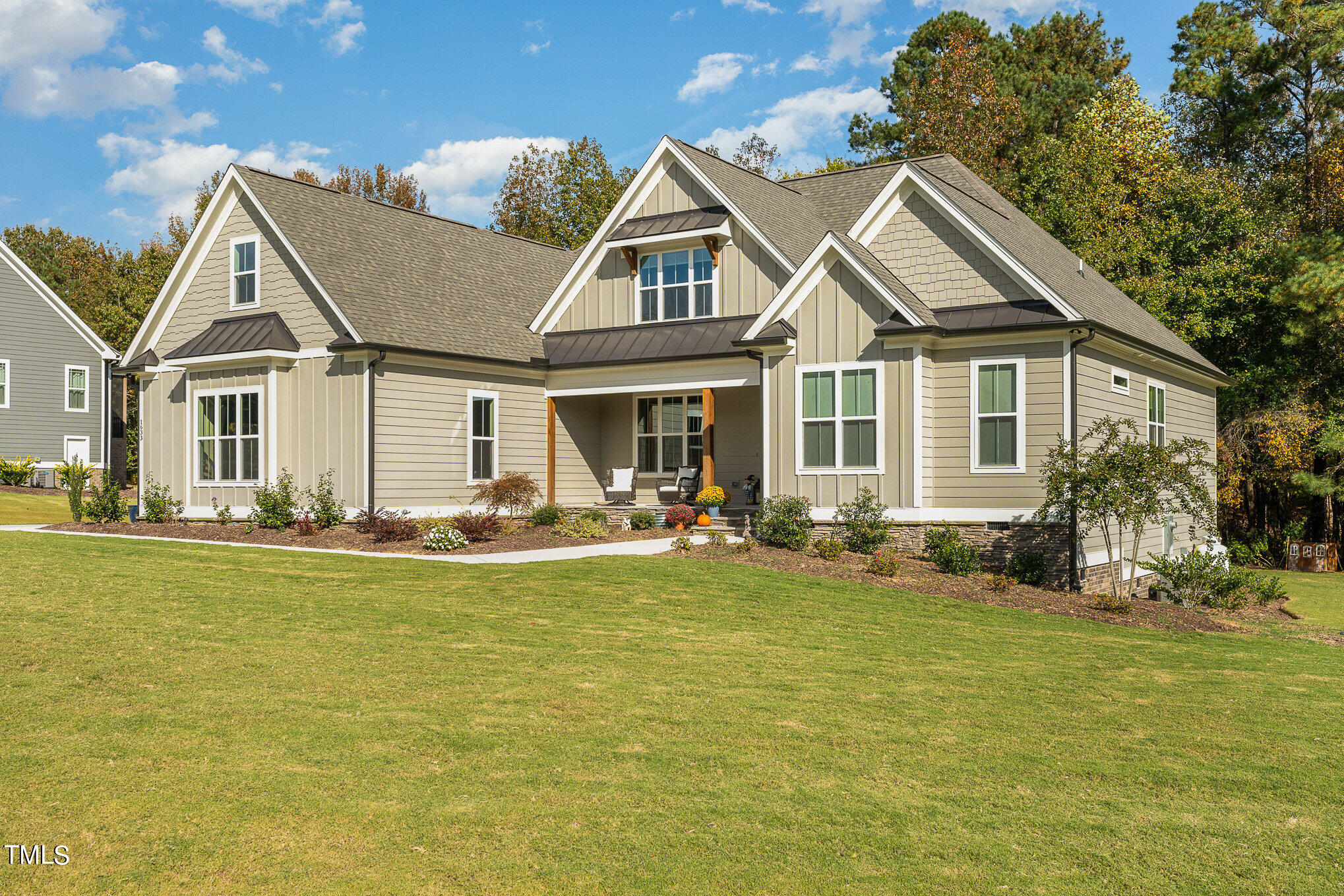 1633 Sweetwater Lane Raleigh, NC 27610 - Photo 51 of 54 a front view of a house with swimming pool having outdoor seating