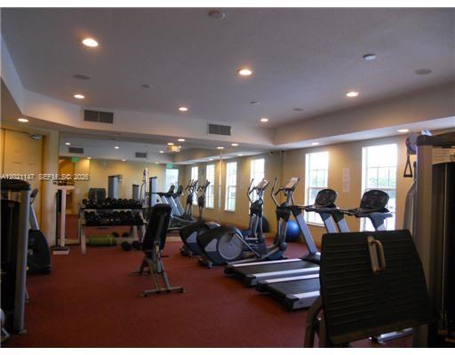 5930 Abbey Road Tamarac, FL 33321 - Photo 22 of 26 a view of a room with gym equipment