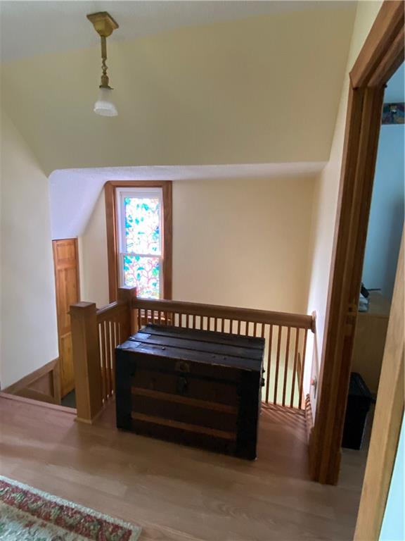 202 Terrace Avenue Apollo, PA 15613 - Photo 16 of 25 Hallway to bedrooms. Note the large lighted closet at the top of the stairs. Great for storing cleaning supplies. Also, the original gas light has been converted to electric.