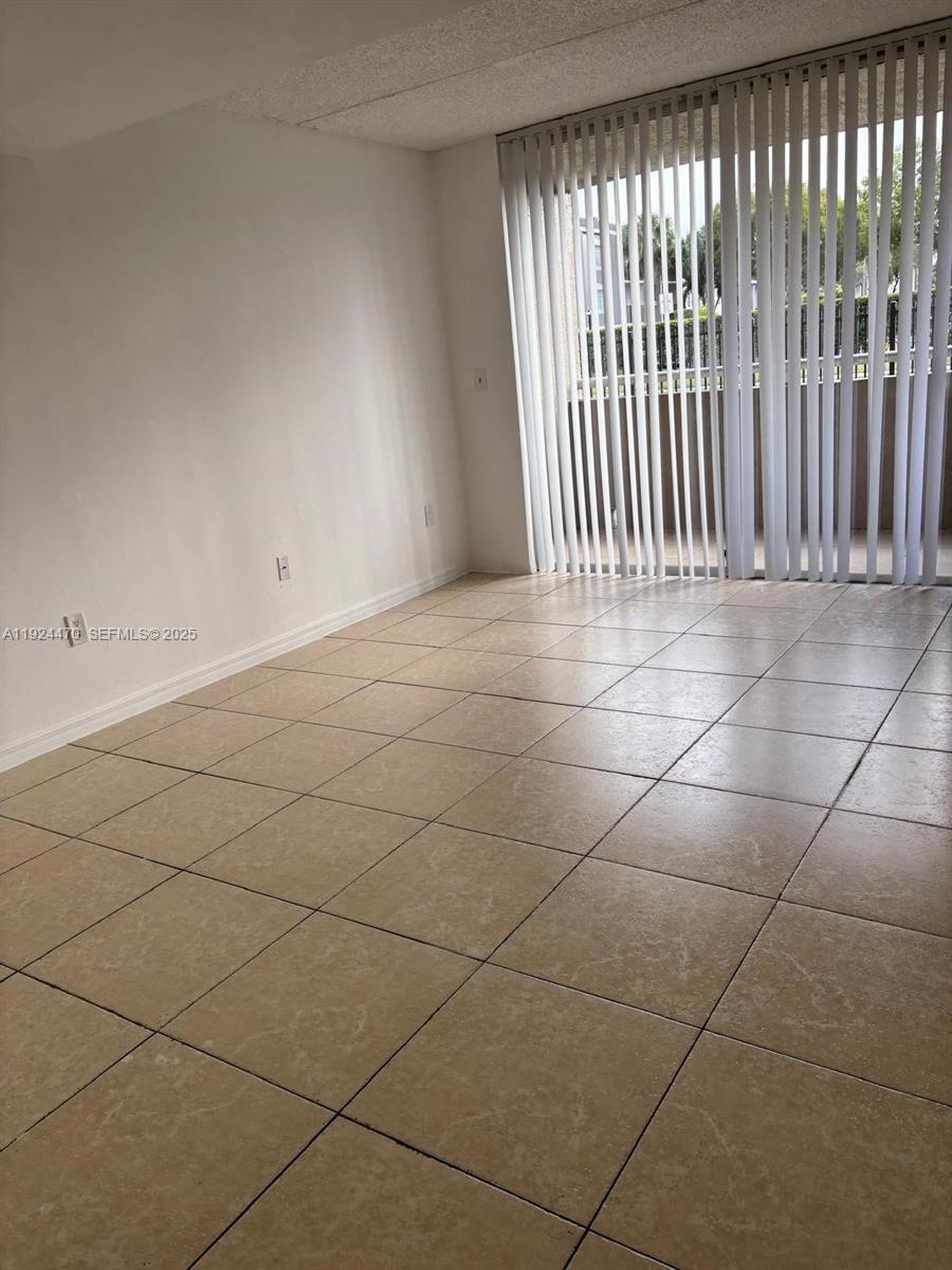 6045 Northwest 186th Street, Unit 123 Hialeah, FL 33015 - Photo 3 of 9