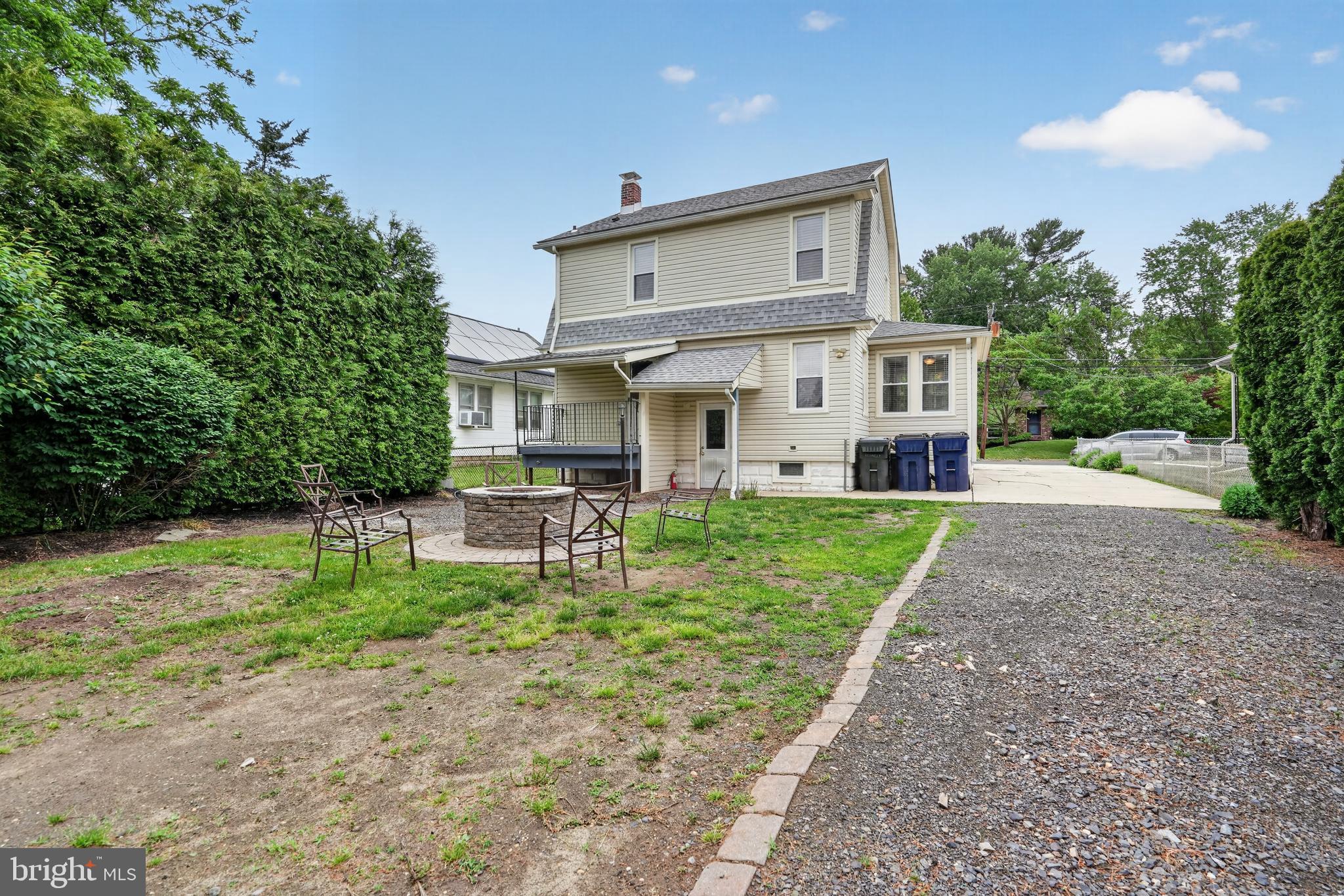 106 Ford Street Voorhees, NJ 08043 - Photo 29 of 36 a front view of a house with a yard and trees