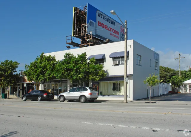 a view of a car park in front of a building