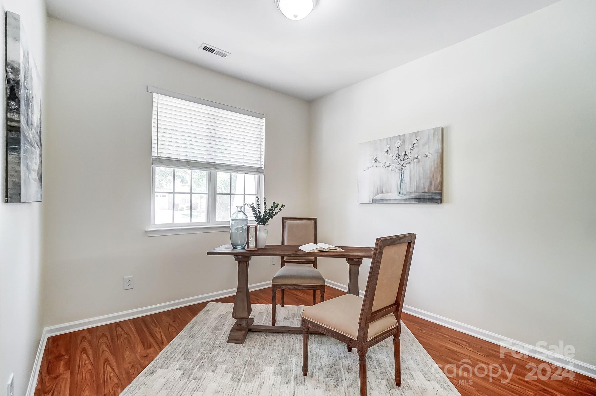 6514 Del Rio Road Charlotte, NC 28277 - Photo 16 of 42 a workspace room with furniture and a window