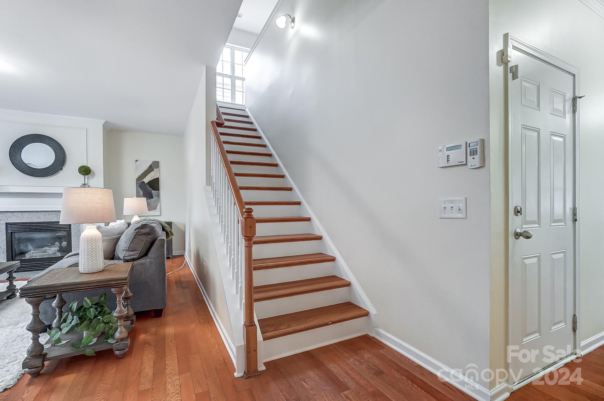 6514 Del Rio Road Charlotte, NC 28277 - Photo 19 of 42 a view of entryway and hall with wooden floor