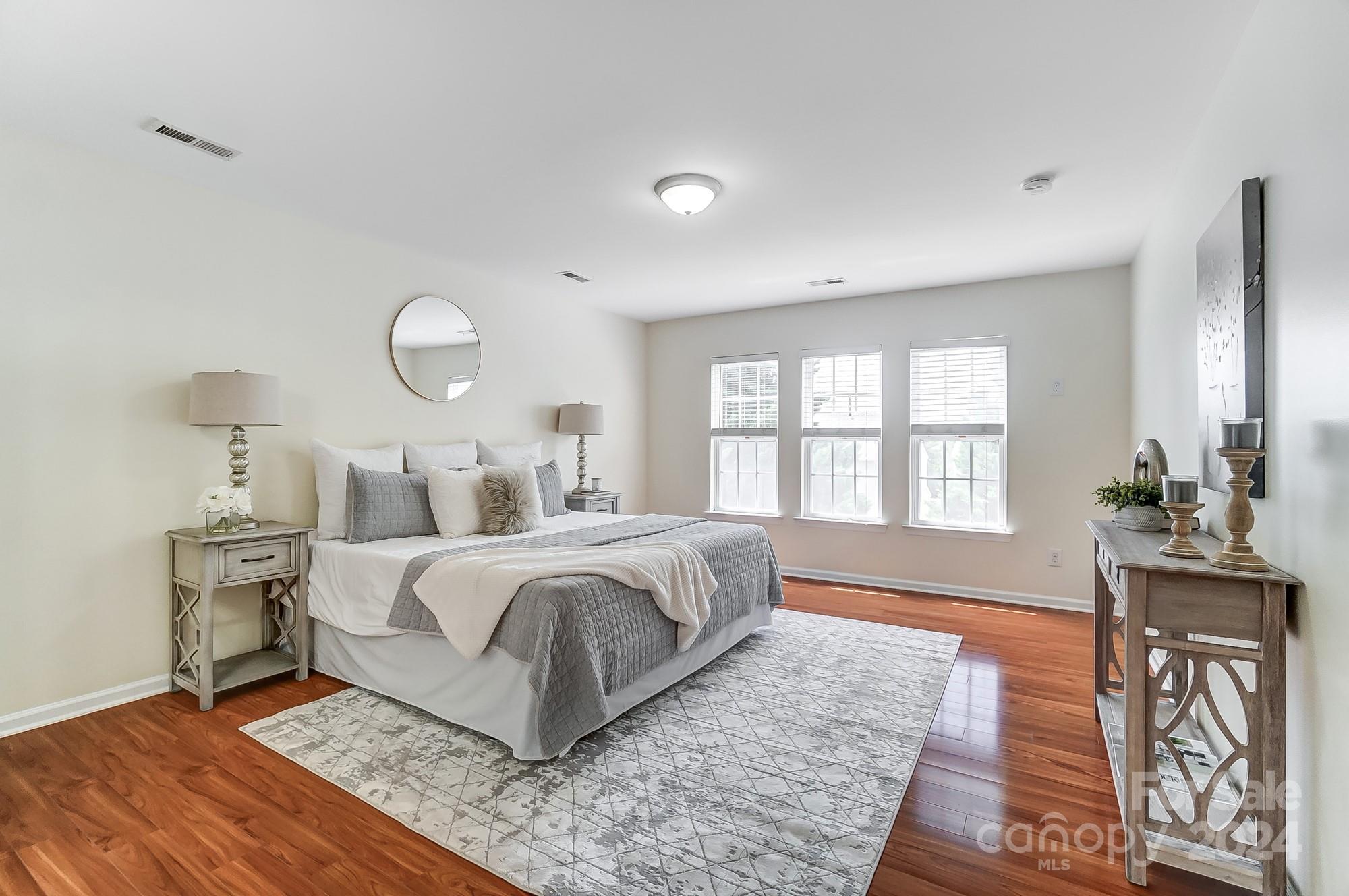 6514 Del Rio Road Charlotte, NC 28277 - Photo 21 of 42 a bedroom with a large bed and a window
