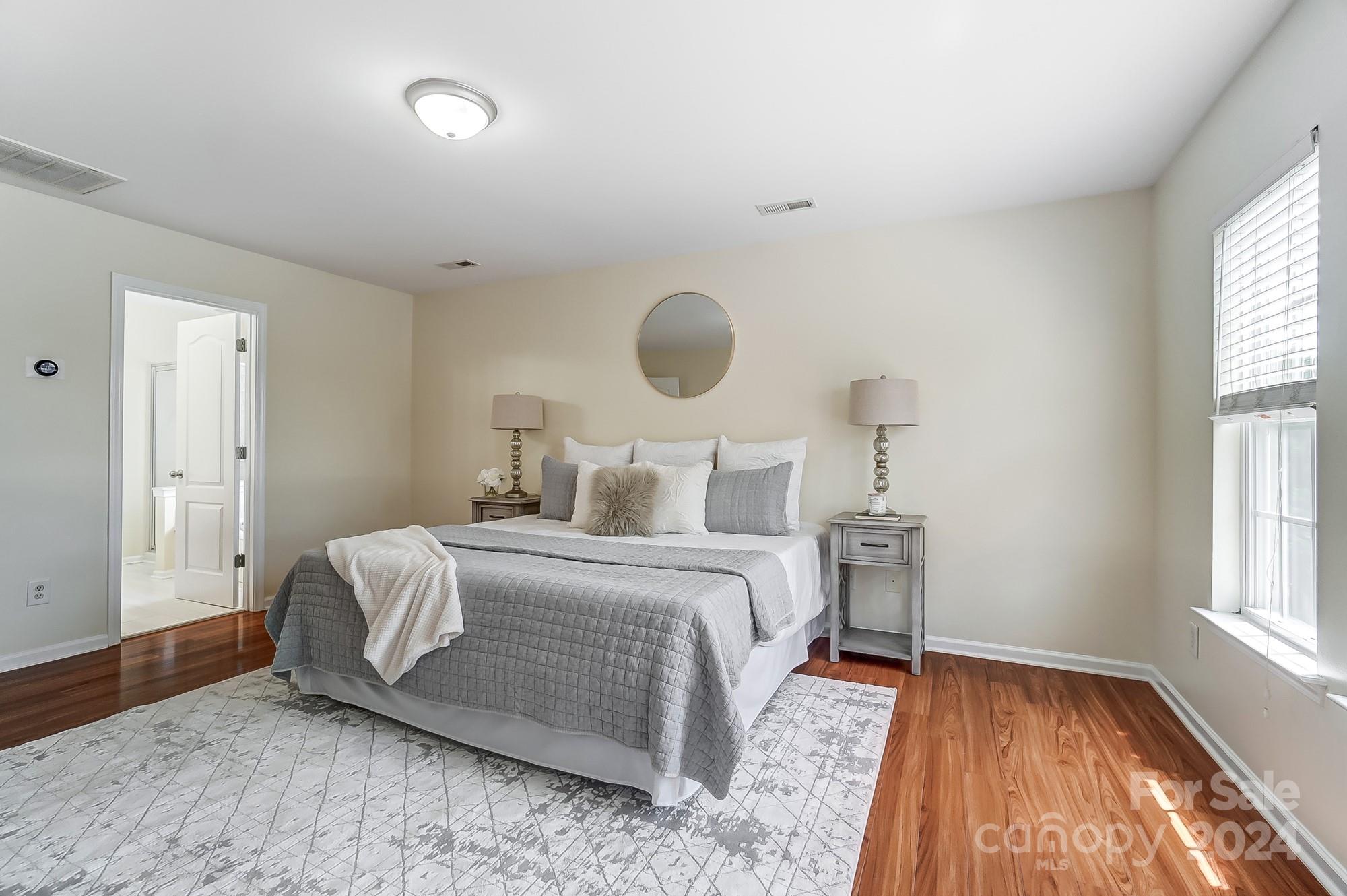 6514 Del Rio Road Charlotte, NC 28277 - Photo 22 of 42 a bedroom with a bed and window