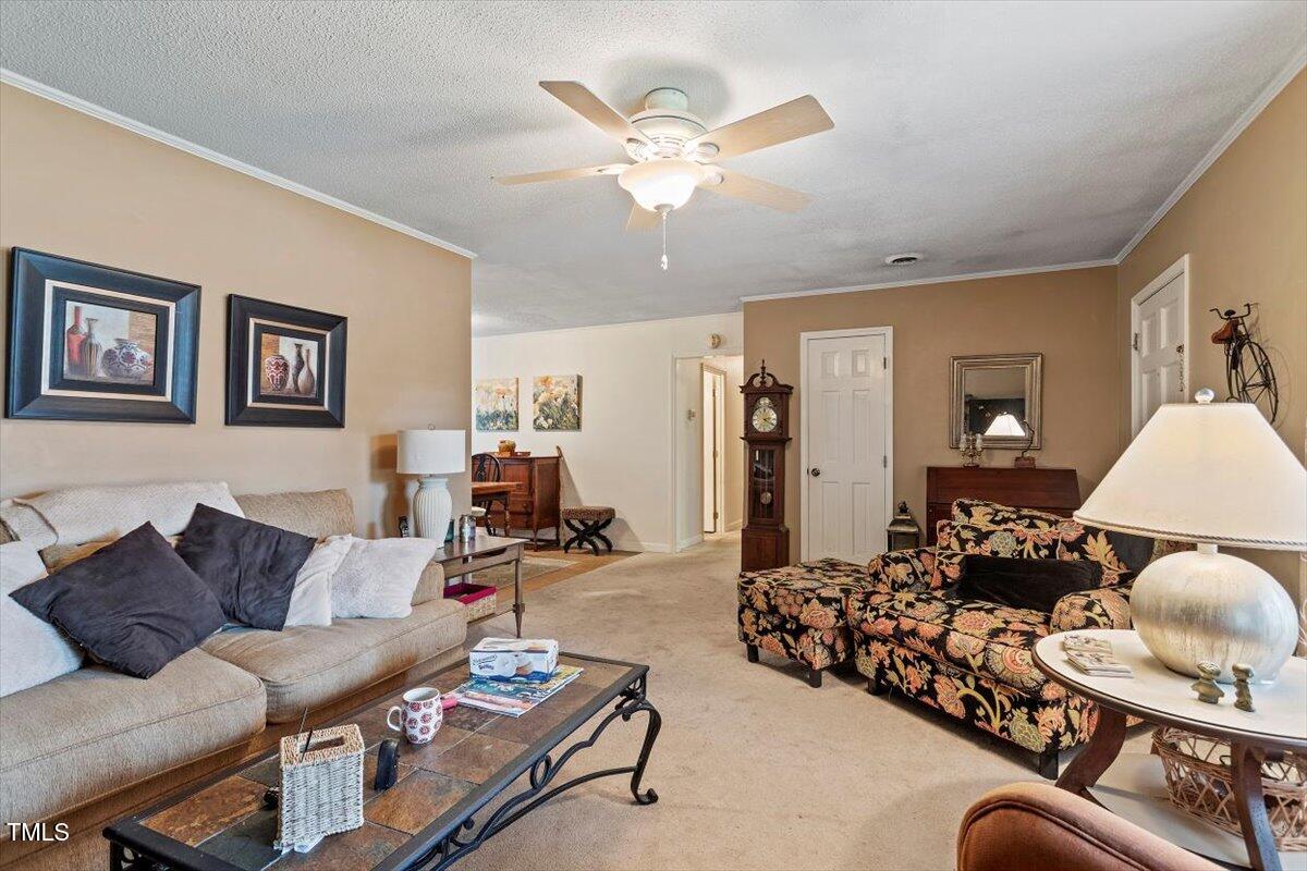 613 Devon Place Zebulon, NC 27597 - Photo 8 of 25 a living room with furniture
