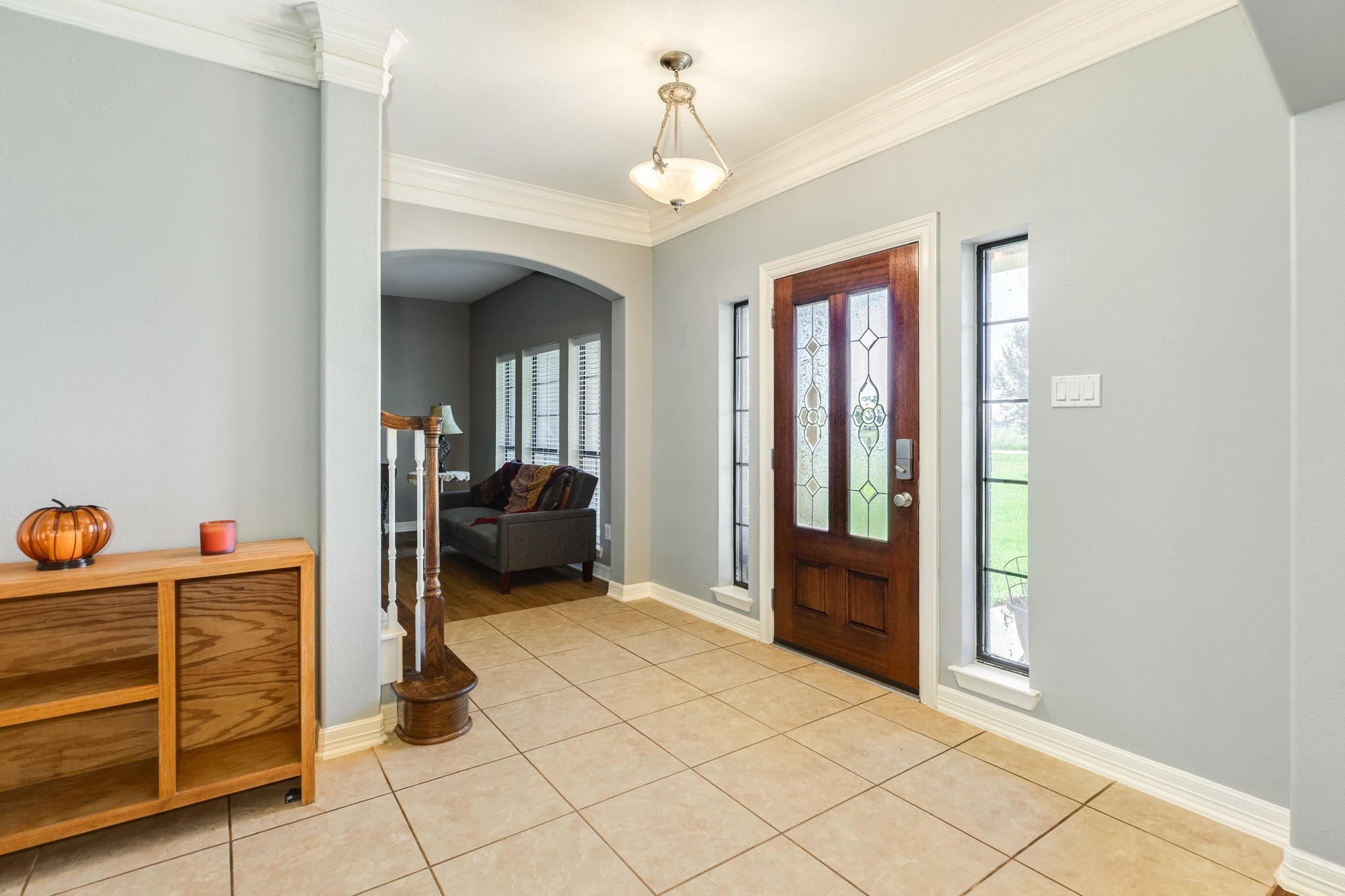 16211 Tankersley Drive Rosharon, TX 77583 - Photo 13 of 46 a living room with furniture and a chandelier