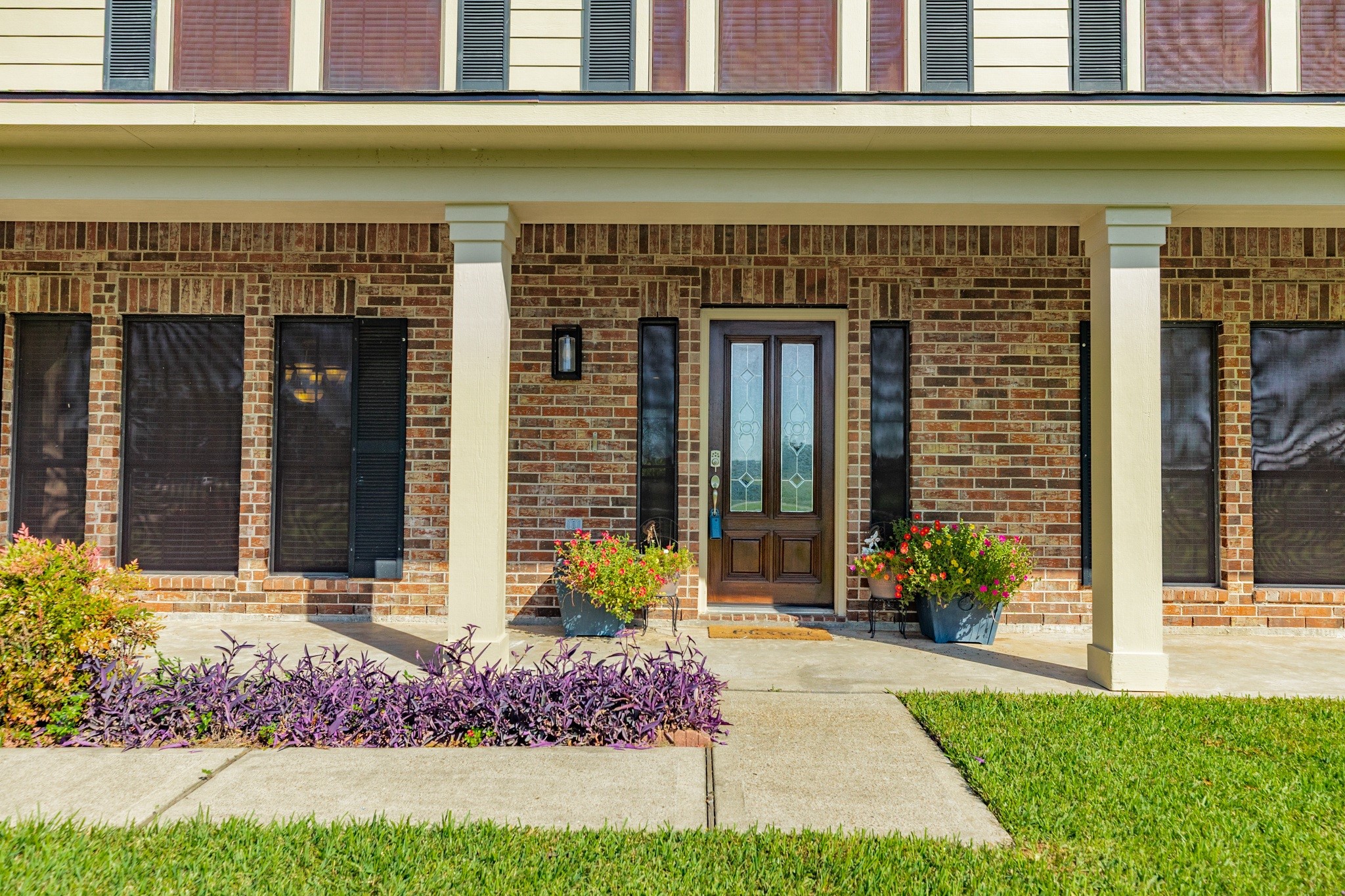 16211 Tankersley Drive Rosharon, TX 77583 - Photo 3 of 46 a front view of a house with a yard