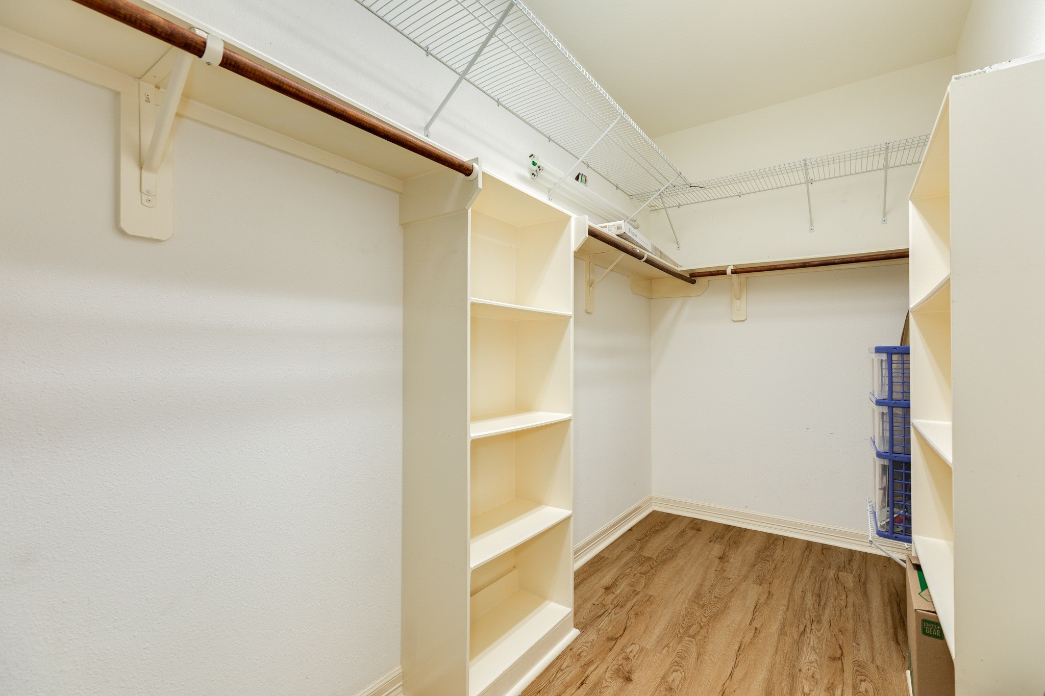 16211 Tankersley Drive Rosharon, TX 77583 - Photo 32 of 46 a view of walk in closet with empty racks