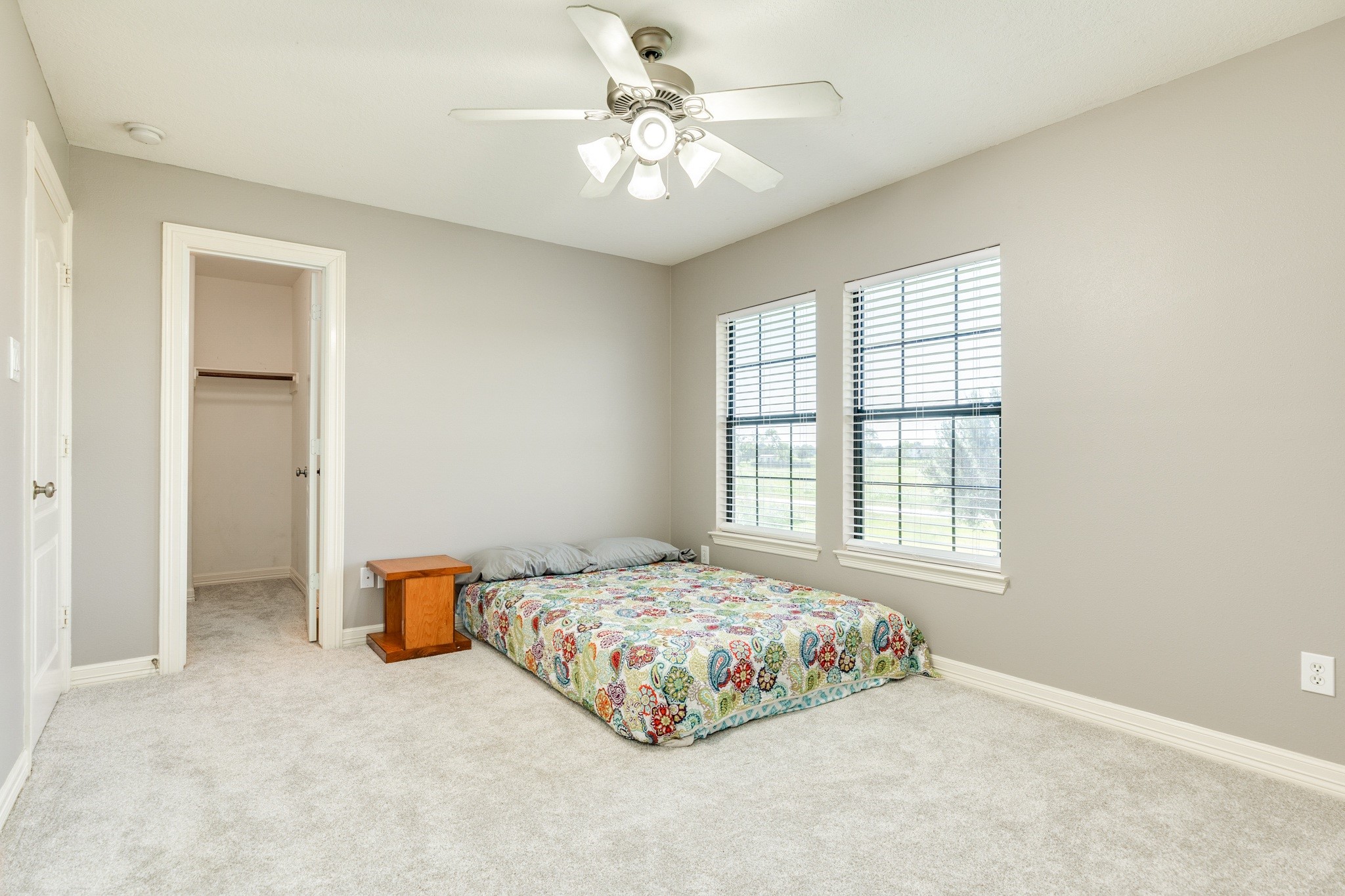 16211 Tankersley Drive Rosharon, TX 77583 - Photo 37 of 46 a bedroom with a bed and a window
