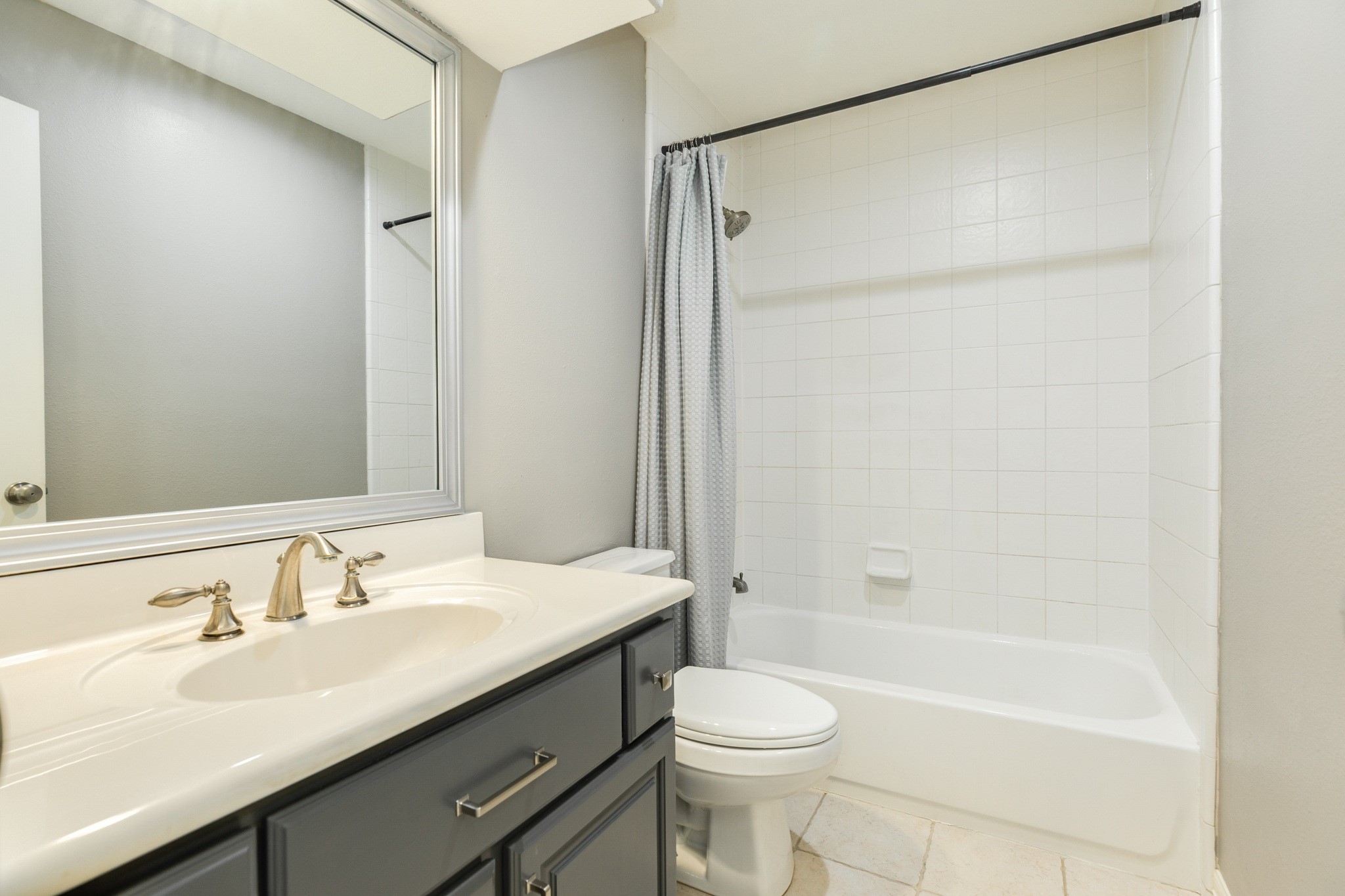 16211 Tankersley Drive Rosharon, TX 77583 - Photo 42 of 46 a bathroom with a sink and a mirror