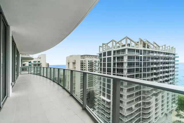 a view of balcony with a potted plant