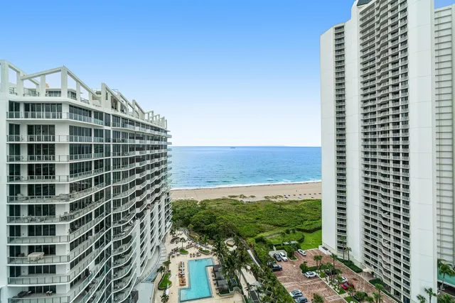 a view of a building with a yard