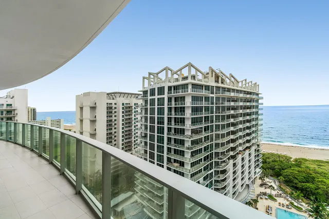 a view of a balcony with city view