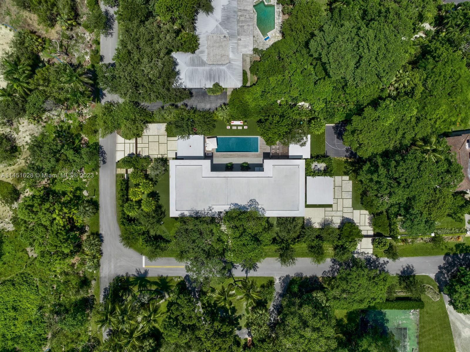9261 School House Road Coral Gables, FL 33156 - Photo 64 of 65 an aerial view of a house with outdoor space