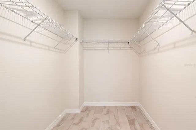 a view of a room with racks on the wall