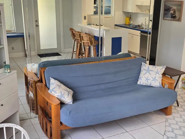 a living room with furniture and a couch