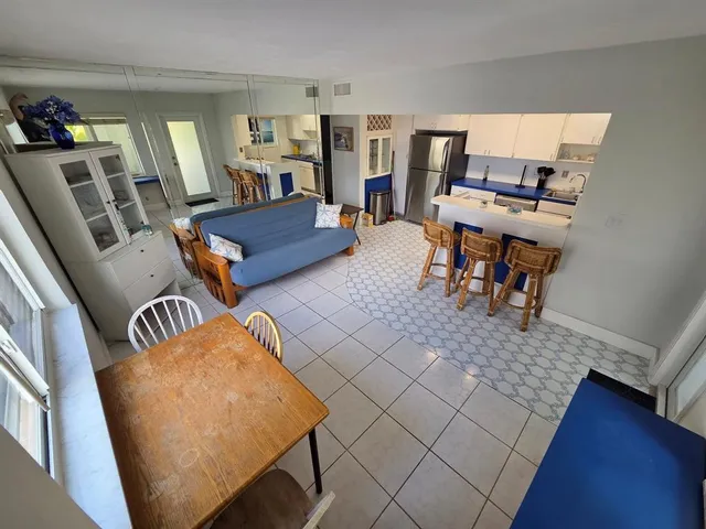 a view of a building with sitting area