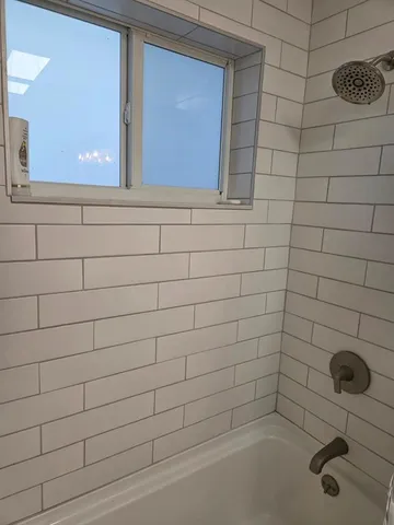 a front view of a building with street view