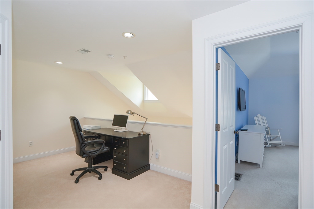61 Providence Road, Unit 2 Grafton, MA 01519 - Photo 24 of 35 a view of workspace with lounge chair
